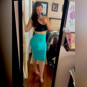 BeBe skirt high waisted, very compressive, so holds everything in 😉